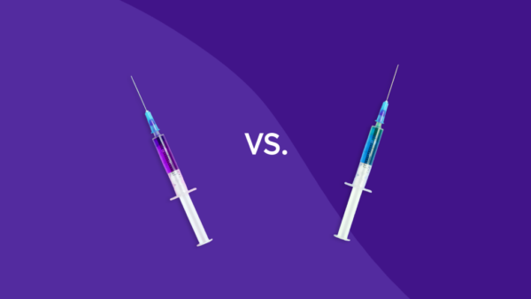 Two syringes representing Praluent vs Repatha comparison