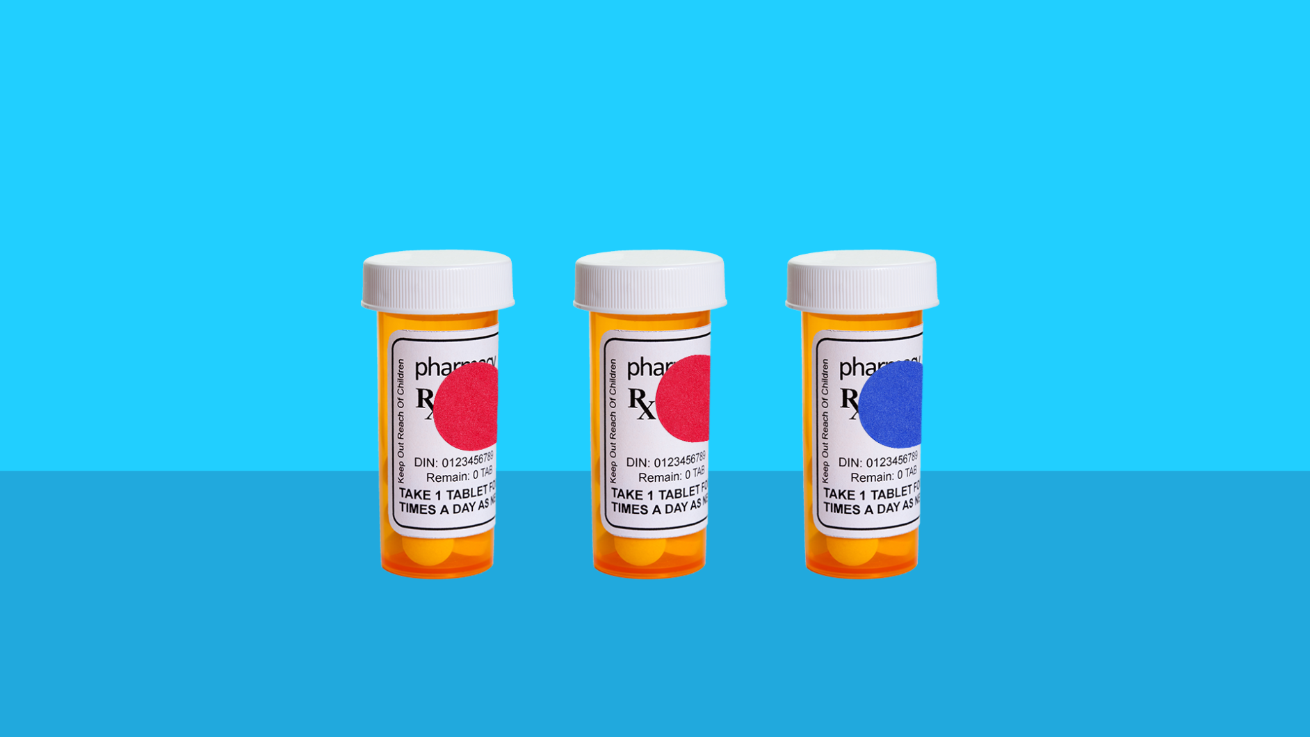 Three pill bottles with color coding