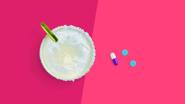 An image of a margarita and pills represents the combination of Adderall and alcohol