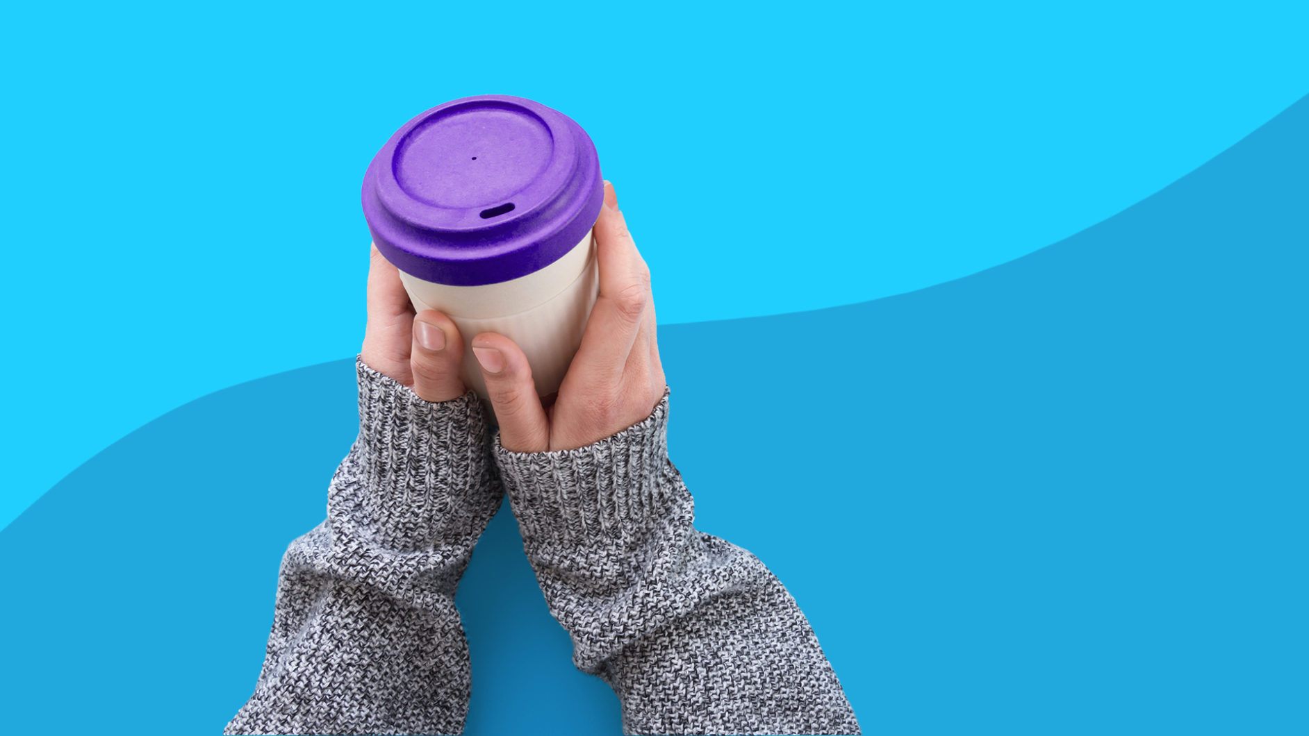 Living with psoriasis - covered hands and coffee cup