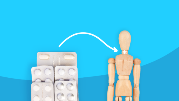 Pills and a model of a person represent living with hypothyroidism