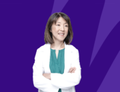 A woman in a white coat represents pharmacist stress