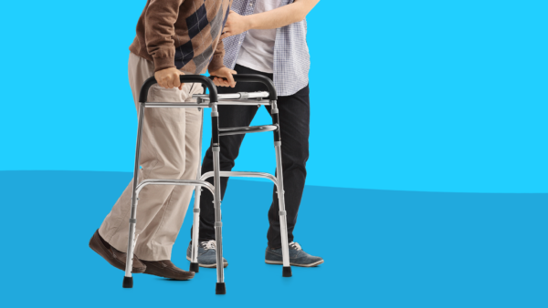 How to avoid caregiver burnout - man using walker with help