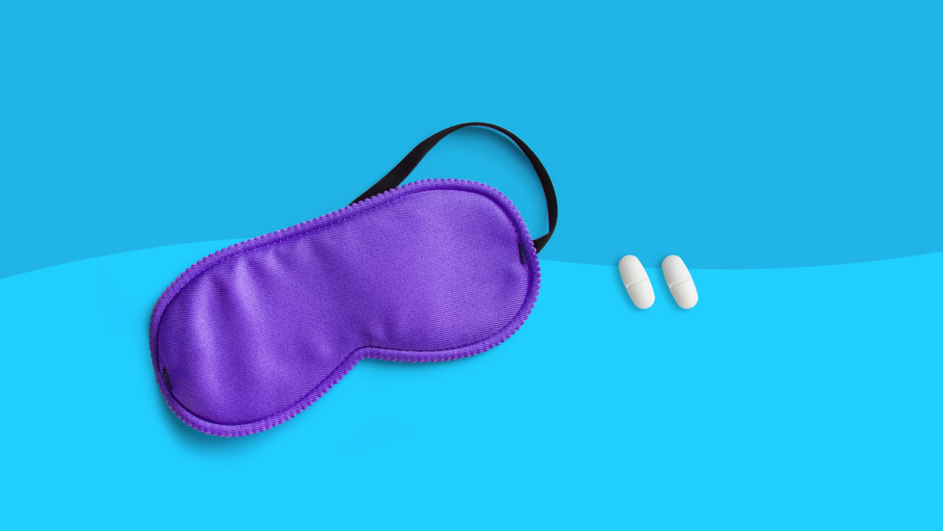 An eye mask and pills represent sleep aids