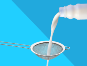 Milk pouring through a sieve represents medications when breastfeeding