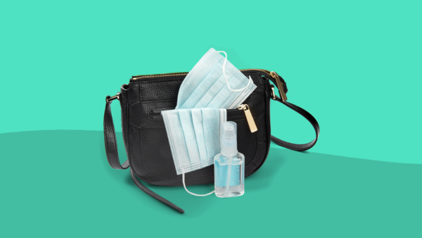 A purse with masks and hand sanitizer represent preparing for coronavirus