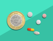 Mexican coin next to pills-buy medicine in Mexico