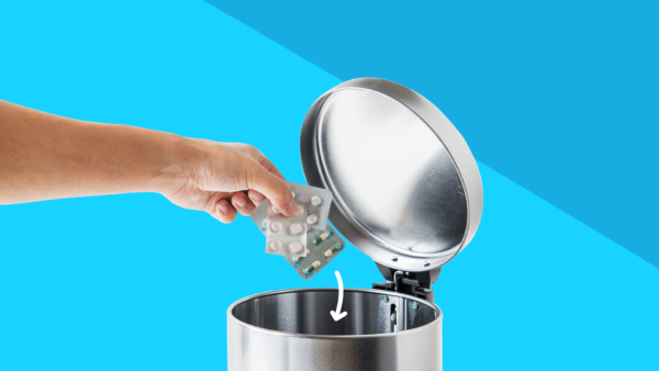 Hand reaching into trash can to throw away medications: How to dispose of medication