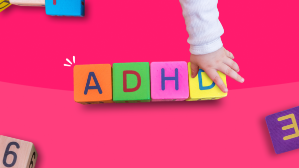 A child's hand with blocks represents ADHD misdiagnosis