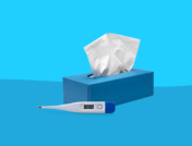 Flu symptoms - tissue box and thermometer