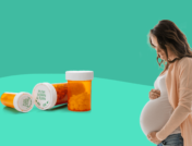 A woman and Rx bottles represent antibiotics during pregnancy