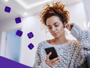 Woman looking at phone: Best apps for ADHD