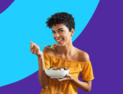 A woman eating a salad represents an IBS diet