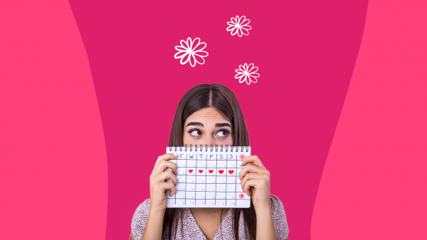 Woman holding a calendar: Questions for Well-Woman Exam
