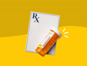 Prescription pad with pill bottle: Common vs. serious Depakote side effects