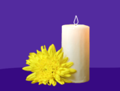 Pillar candle with flower: What is grief and how can you cope?