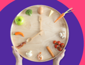 A clock with food represents the question: Is intermittent fasting safe?