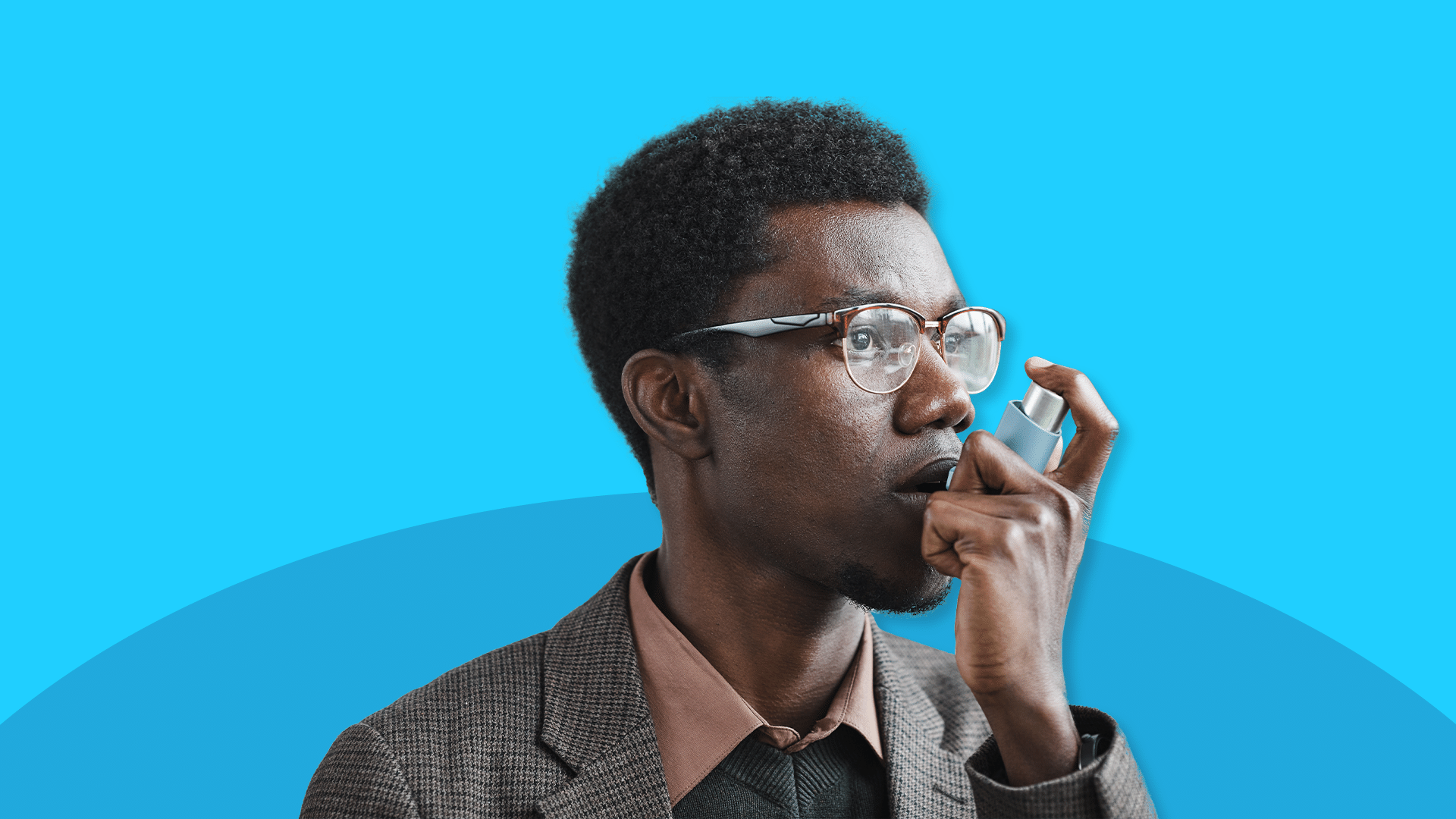 A man with an inhaler represents asthma facts and statistics