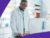 A man behind a pharmacy counter represents how long does it take to become a pharmacist