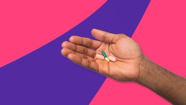 Hand holding Rx pills: Linzess alternatives