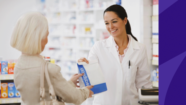 A woman behind the pharmacy counter represents how long it takes to become a pharmacy technician