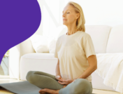 A woman doing breathing exercises as home remedies for asthma