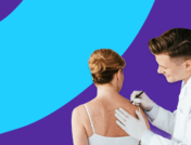 Doctor giving a woman a yearly skin check