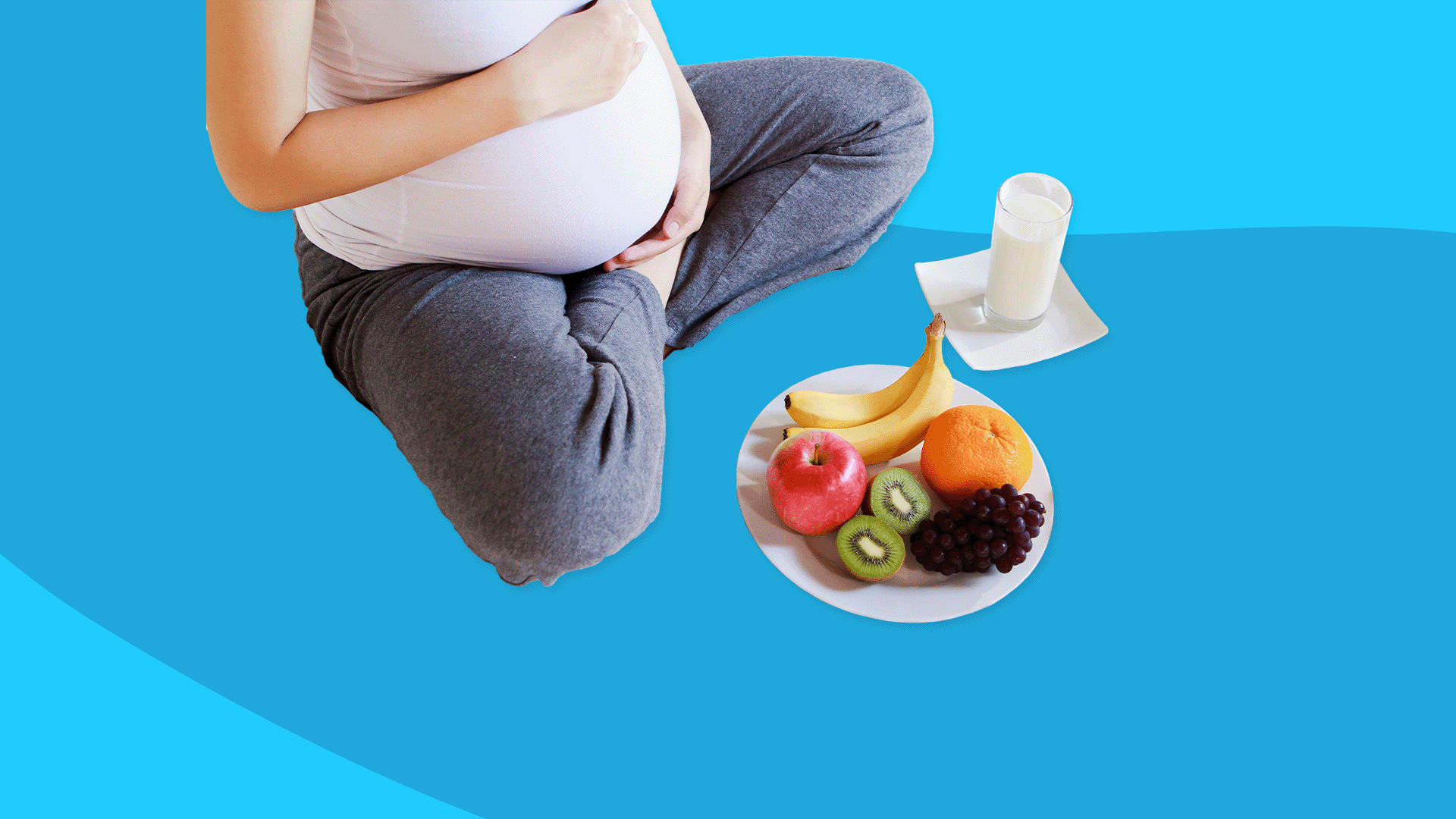 pregnant belly with a bowl of fruit - pregnancy diet