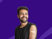 A bandaid on the arm after a COVID booster shot