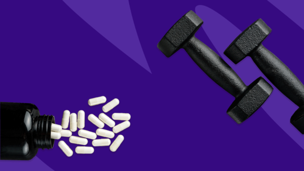 pills next to dumbbells - advil before workout