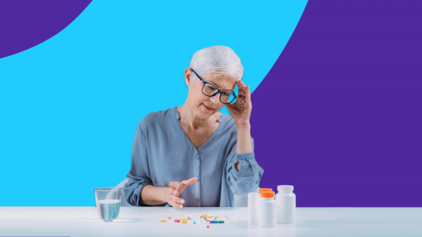 person looking at multiple medications - nonadherence to medication