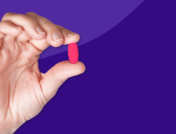 Hand holding Rx pill: Azithromycin side effects and how to avoid them