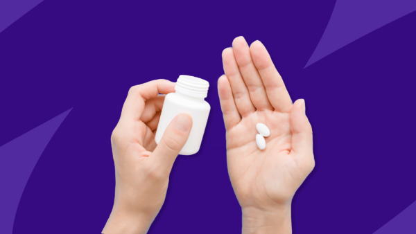 Open hand holding Rx pillss: Naproxen side effects and how to avoid them