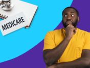 Man looking inquisitively at a Medicare sign and notebook with stethoscope: Does Medicare cover cancer treatment?