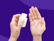 Hand holding Rx pills and and Rx pill bottle: Rybelsus side effects and how to avoid them