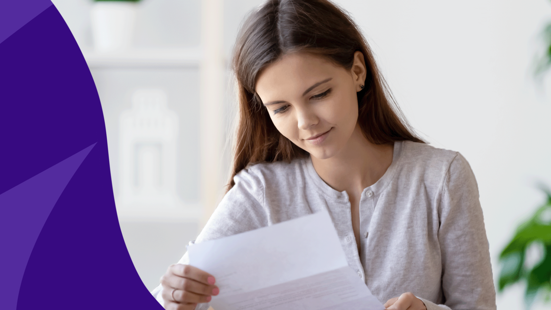 woman looking at a piece of paper - insurance appeal letter