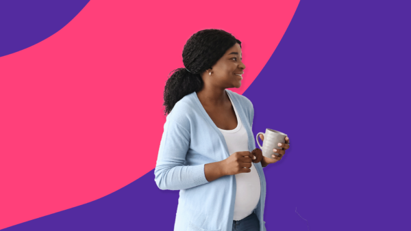 pregnant woman with a cup of coffee - caffeine and pregnancy