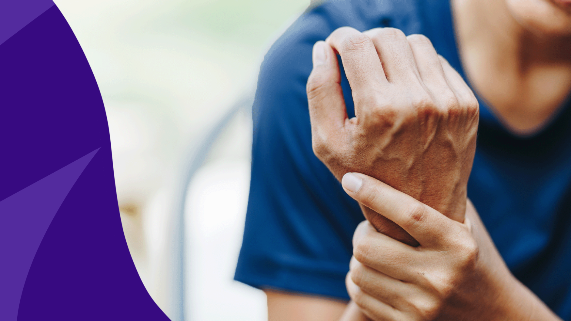 Person holding their wrist - signs of inflammation