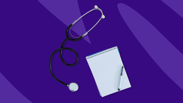 Stethoscope with notebook and pen: Colon cancer symptoms