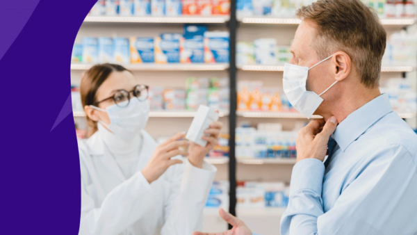 Man holding throat talking to pharmacist: How to get rid of an itchy throat