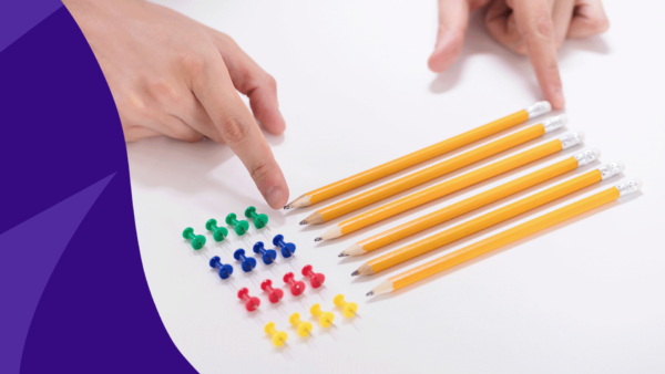 Hands aligning pencils and thumbtacks: What’s the difference between OCPD vs. OCD?