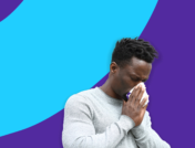 Man blowing his nose: Alergy headache