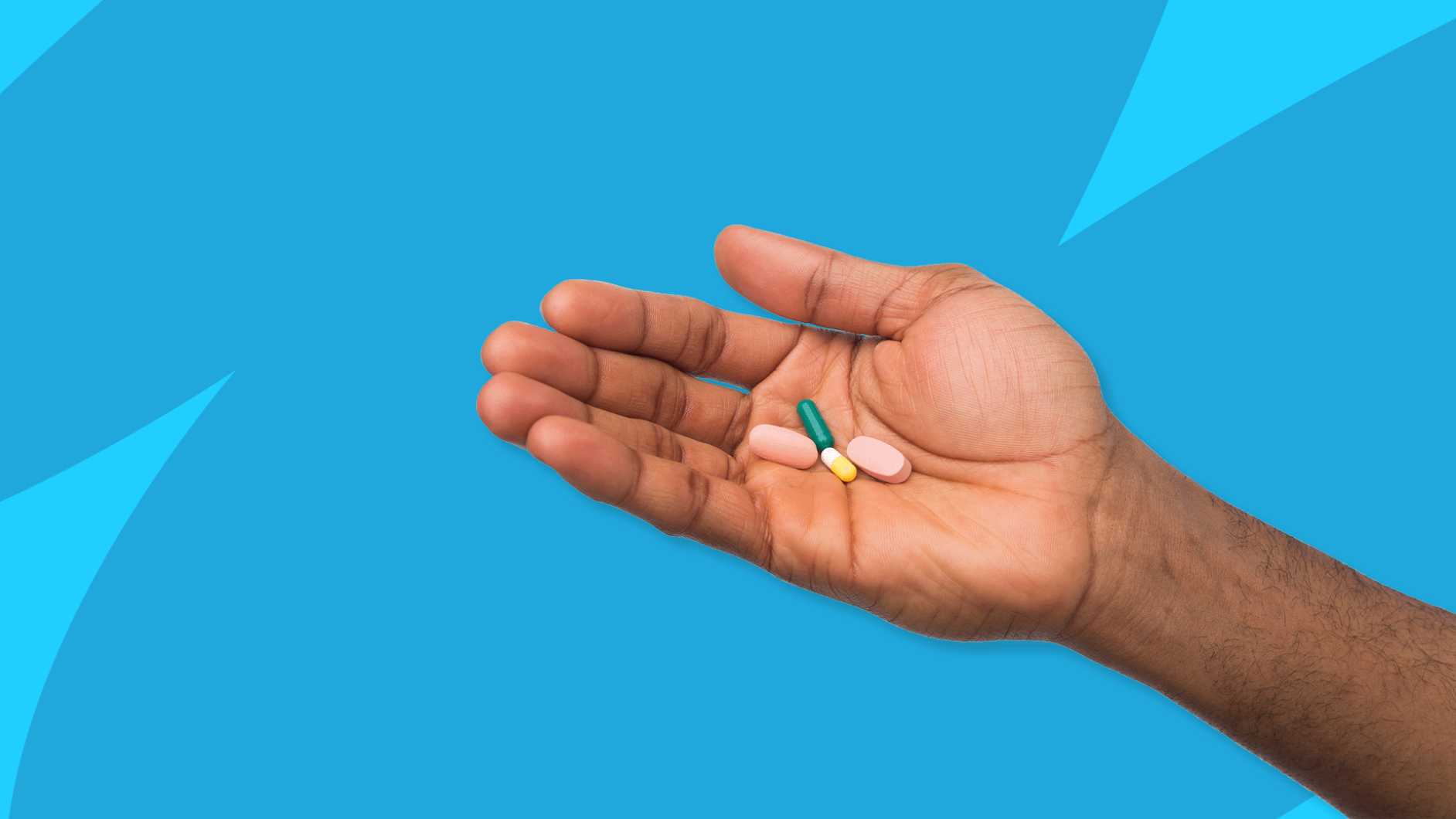 Hand holding Rx pills: Adderall XR (amphetamine-dextroamphetamine ER) alternatives
