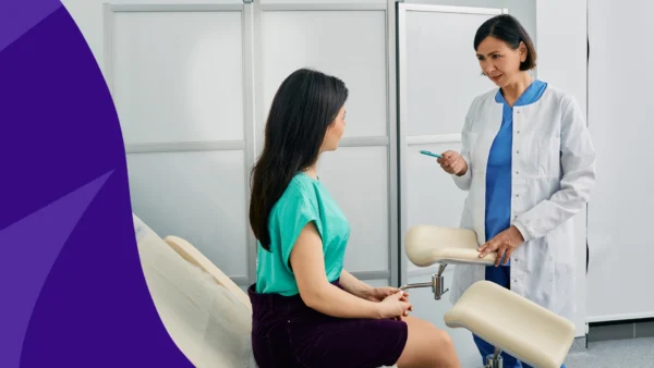 woman sitting in a doctor's office - what is a pelvic exam