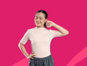 Woman standing with a finger in her ear: Causes of ringing in the ear