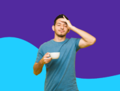 Man holding coffee cup with his hand on his forehead: Hangover headache