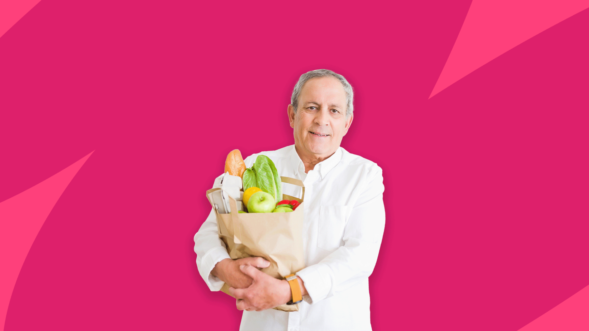 A healthcare provider carrying a grocery bag with various foods