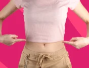 Person in a crop top - causes of belly button pain