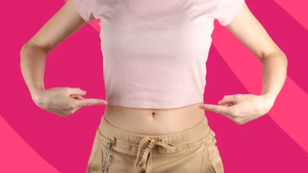Person in a crop top - causes of belly button pain