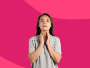 Woman with her hands on her neck touching her thyroid gland: Nmedies for hypothyroidism